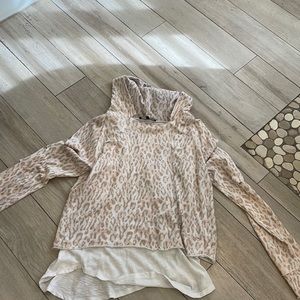 Generation love distressed cheetah sweatshirt with built in T-shirt.